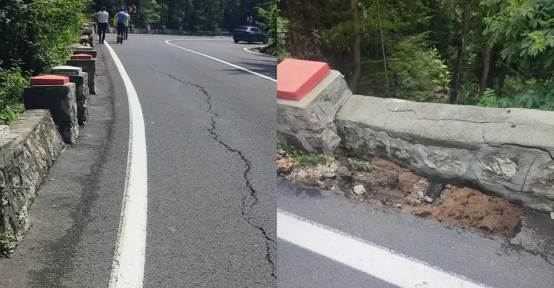 Zid de sprijin surpat pe drumul spre Poiana Braşov, după ploile abundente. Circulaţia se desfăşoară alternativ