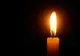 Incendiu de la o lumânare lăsată nesupravegheată