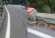 Zid de sprijin surpat pe drumul spre Poiana Braşov, după ploile abundente. Circulaţia se desfăşoară alternativ
